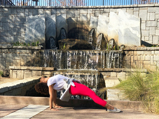 Girl doing stretches in fitness wear